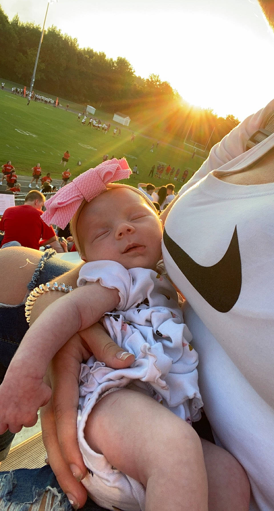 Madalyn joined the competition — help win amazing prizes! baby, baby_toddler_clothing, baseball_cap, child, event, fun, grass, happy, hat, lap, leisure, person, recreation, shorts, sky, summer, sun_hat, sunlight, thigh, toddler