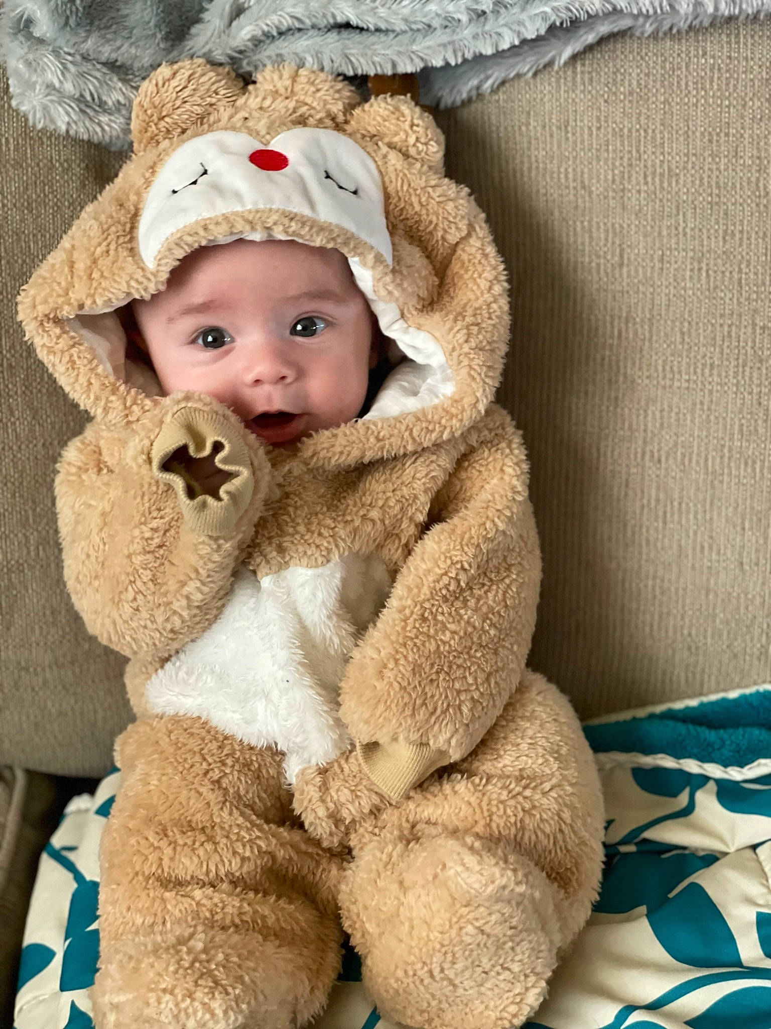 Daxton joined the competition — help win amazing prizes! baby, baby_toddler_clothing, beige, cap, cheek, child, comfort, eye, face, fashion_accessory, fur, fur_clothing, headwear, knit_cap, linens, outerwear, person, skin, sleeve, textile