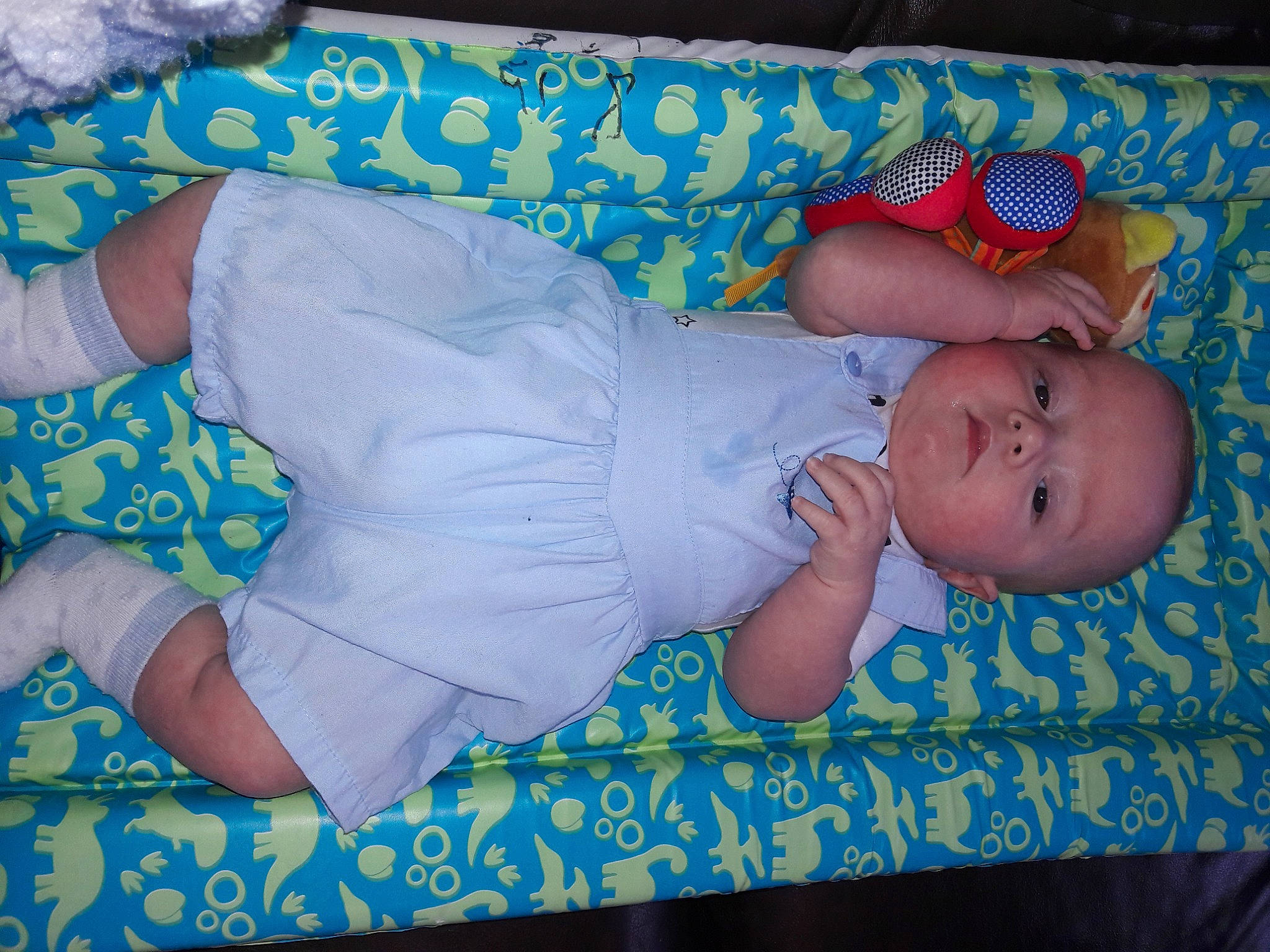 Leo James joined the competition — help win amazing prizes! arm, azure, baby, baby_products, baby_safety, baby_toddler_clothing, child, comfort, electric_blue, finger, hand, human_body, lap, pattern, person, photograph, pink, product, sitting, textile