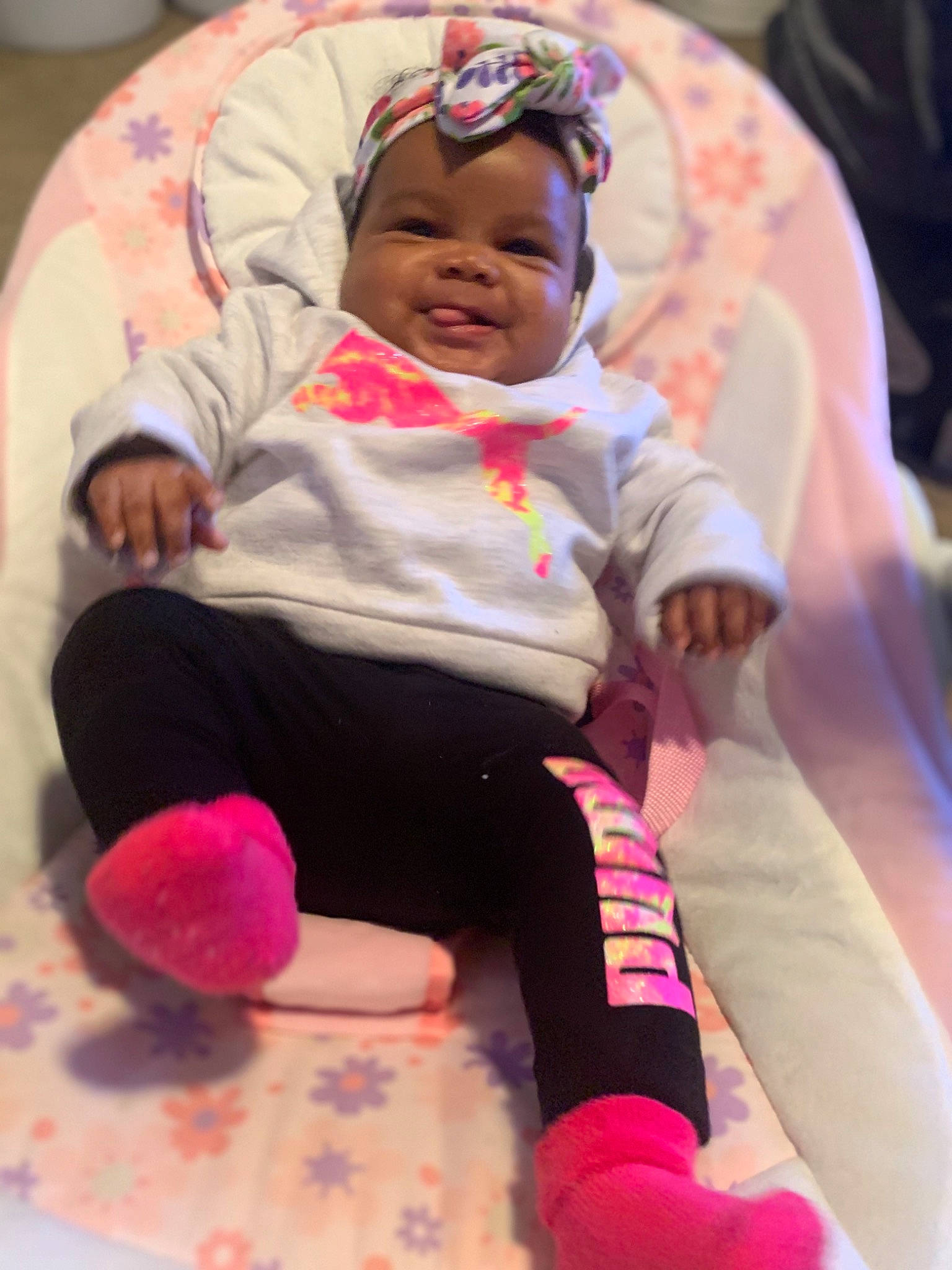 Royal is registered to the contest to win money with this photo: baby, baby_toddler_clothing, cheek, child, comfort, event, fun, happy, hat, magenta, person, pink, purple, sitting, skin, sleeve, smile, sock, thigh, toddler