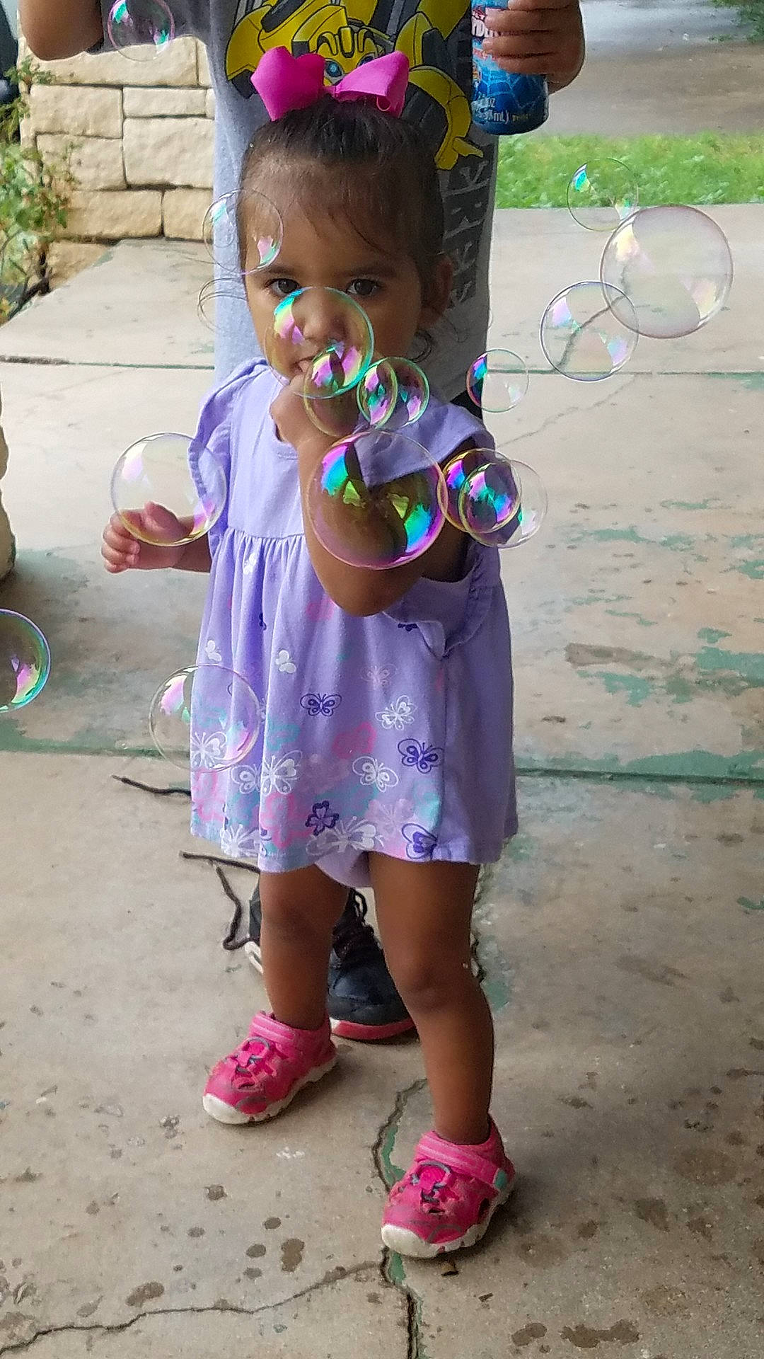 Charlotte is registered to the contest to win money with this photo: child, day, fun, girl, happiness, infant, joy, person, pink, play, purple, skin, smile, standing, summer, toddler, vacation