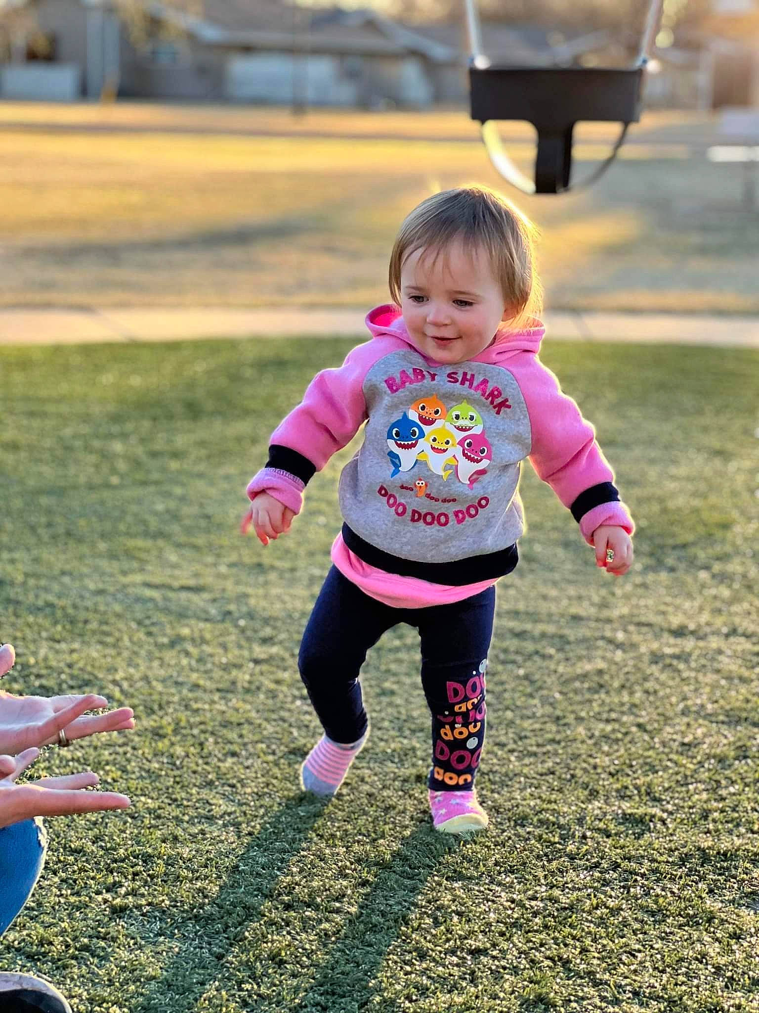 Emmaleigh is registered to the contest to win money with this photo: baby, baby_toddler_clothing, child, city, footwear, fun, grass, happy, joy, lawn, leisure, magenta, mammal, people_in_nature, person, pink, plant, public_space, recreation, summer