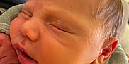 Luciano Ange Milo participe au concours pour gagner de l'argent avec cette photo : baby, newborn, sleeping, close_up, face, infant, skin, head, ear, clothing, hand, peaceful, soft, young, portrait, cute, resting, indoors, child, person