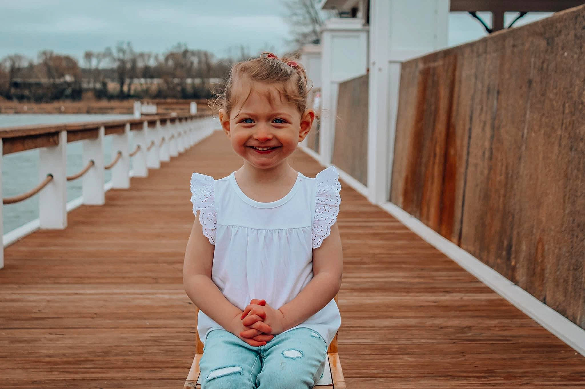 Elaina joined the competition — help win amazing prizes! baby_toddler_clothing, blond, child, facial_expression, flooring, fun, hair, hairstyle, happy, hardwood, joy, leisure, pattern, person, plant, sky, sleeve, smile, t_shirt, toddler