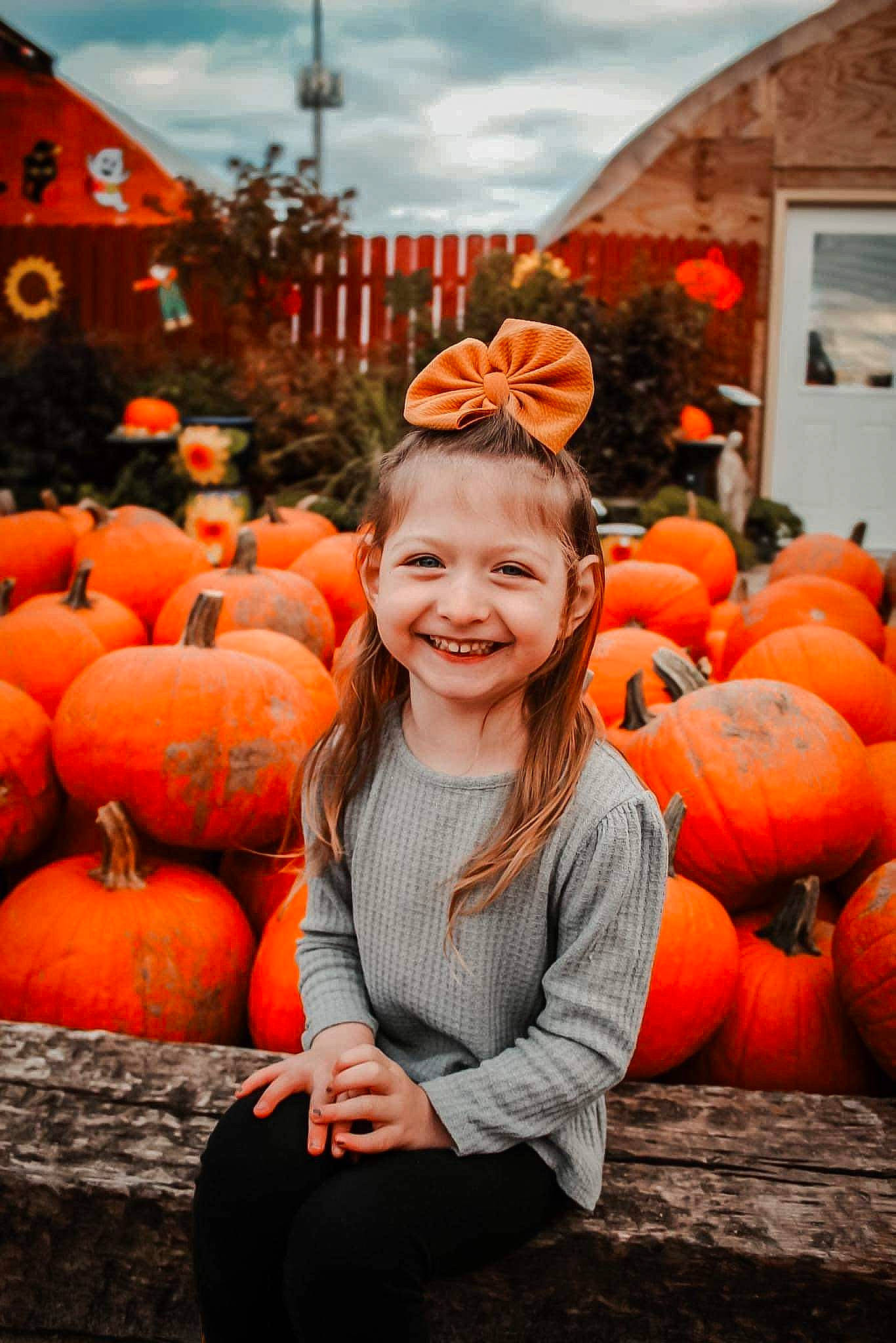 Elaina is registered to the contest to win money with this photo: calabaza, cloud, cucurbita, gourd, happy, human_body, jeans, joy, leaf, natural_foods, orange, people, people_in_nature, person, plant, pumpkin, smile, squash, vegetable, whole_food