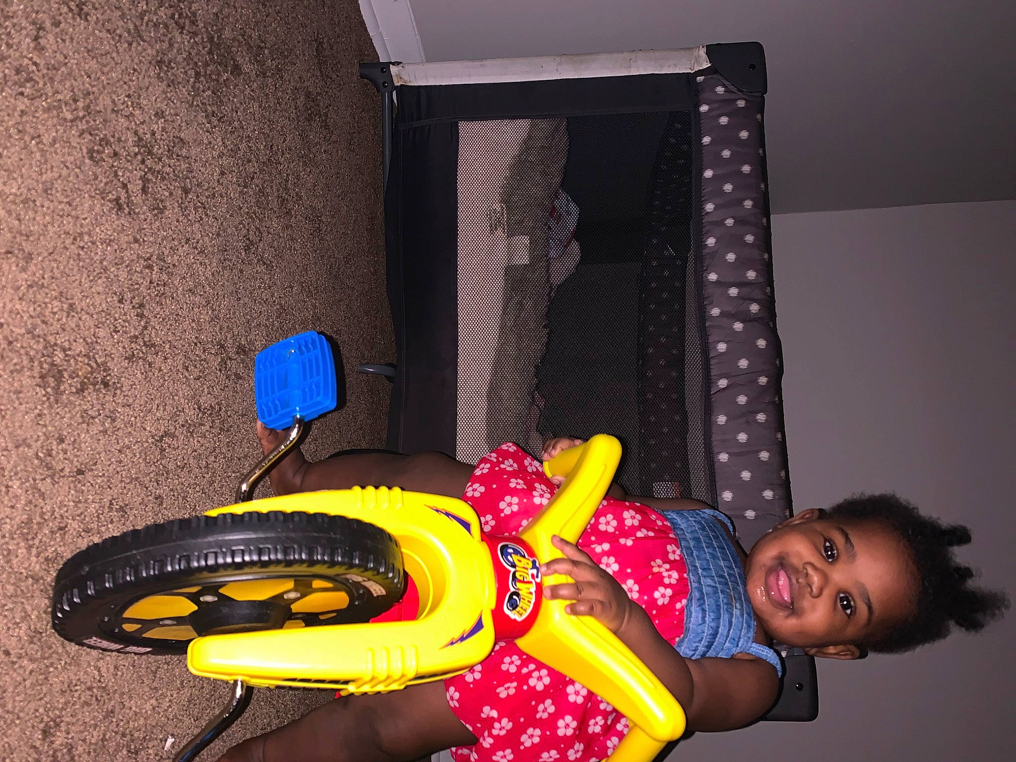 Janae is registered to the contest to win money with this photo: audio_equipment, auto_part, automotive_exterior, automotive_lighting, automotive_tire, automotive_wheel_system, banana_family, bicycle_tire, electric_blue, fender, flooring, fun, helmet, joy, person, personal_protective_equipment, rim, smile, tire, toy