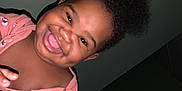 Janae is registered to the contest to win money with this photo: baby, babylaughing, blackhair, bodypart, clothing, cosmetics, dress, face, finger, hair, hand, happy, head, laughing, lipstick, mouth, person, photography, portrait, selfie