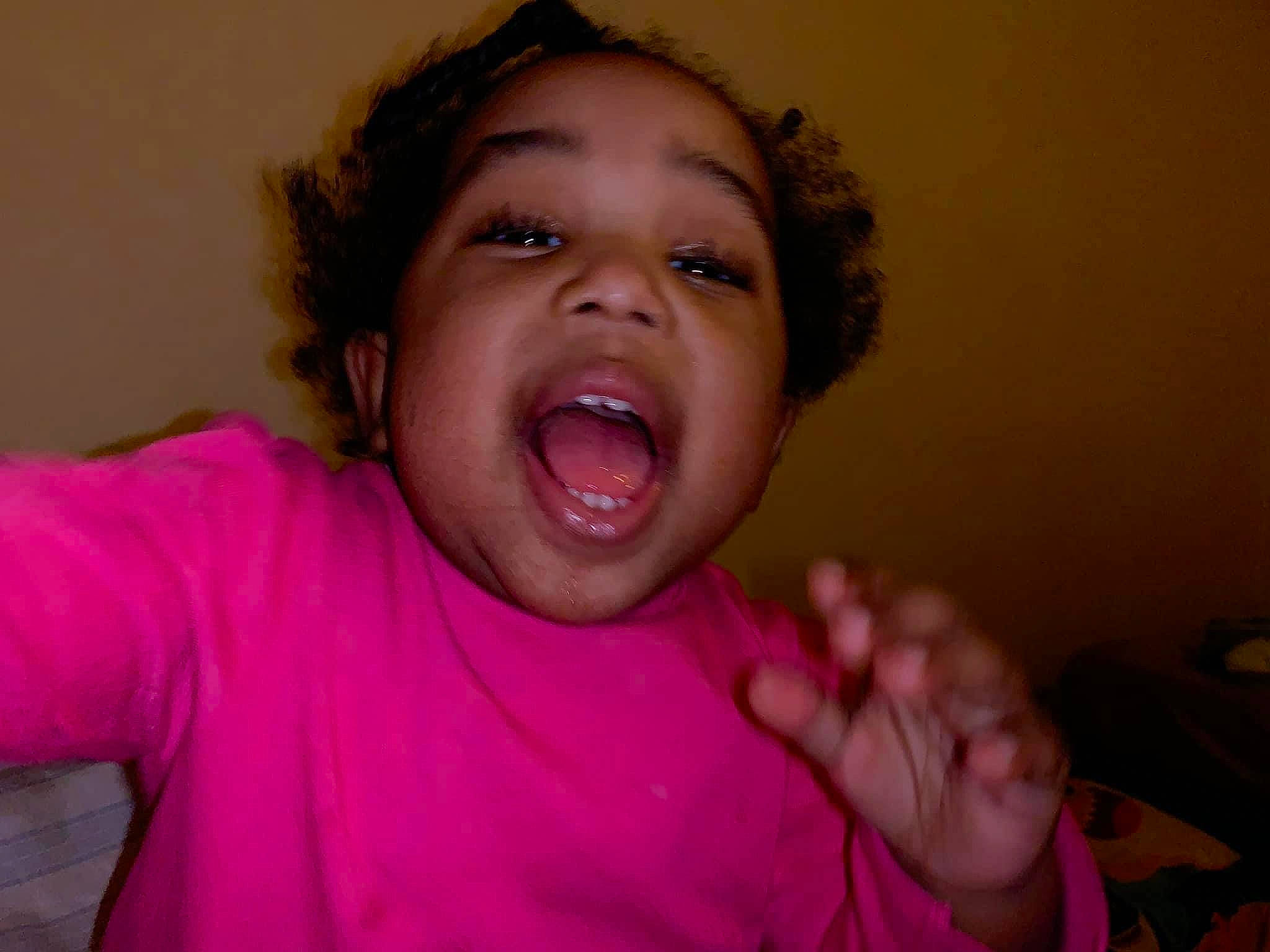 Zinnia is registered to the contest to win money with this photo: cheek, chin, ear, eye, eyebrow, eyelash, facial_expression, gesture, hand, happy, head, human_body, iris, jaw, lip, mouth, neck, nose, person, skin