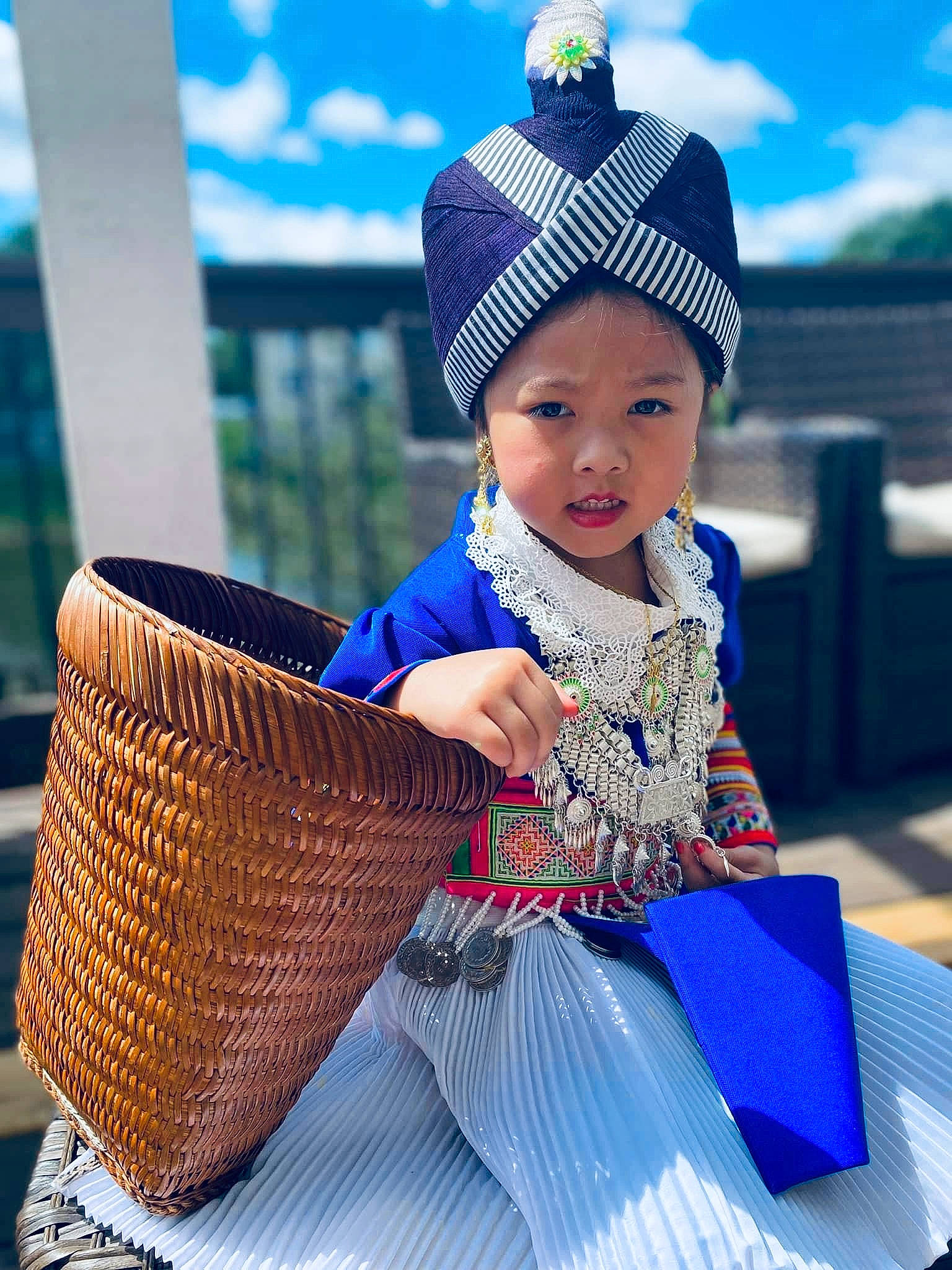 Madeline is registered to the contest to win money with this photo: azure, baby_toddler_clothing, basket, blue, cap, clothing, cloud, fun, grass, hairstyle, happy, hat, headgear, headwear, people_in_nature, person, picnic_basket, recreation, sky, storage_basket