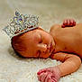baby, newborn, sleeping, crown, jewelry, infant, skin, hand, face, head, blanket, soft, cute, peaceful, resting, closeup, portrait, lying_down, adorable, child