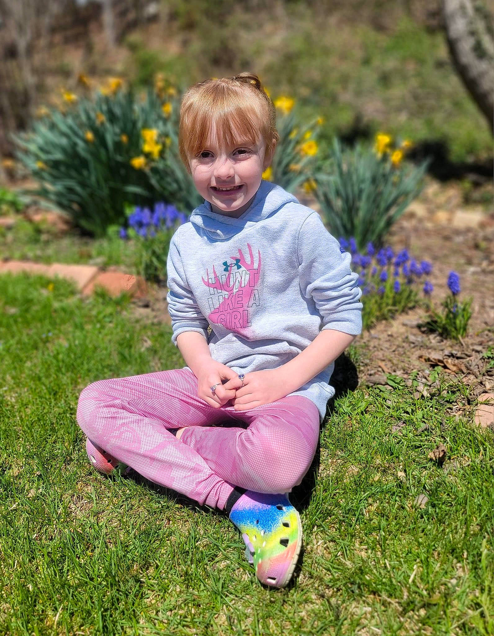 Peyton joined the competition — help win amazing prizes! annual_plant, beauty, child, electric_blue, flower, fun, grass, grass_family, grassland, groundcover, happy, joy, lawn, leisure, meadow, people_in_nature, person, plant, sitting, smile