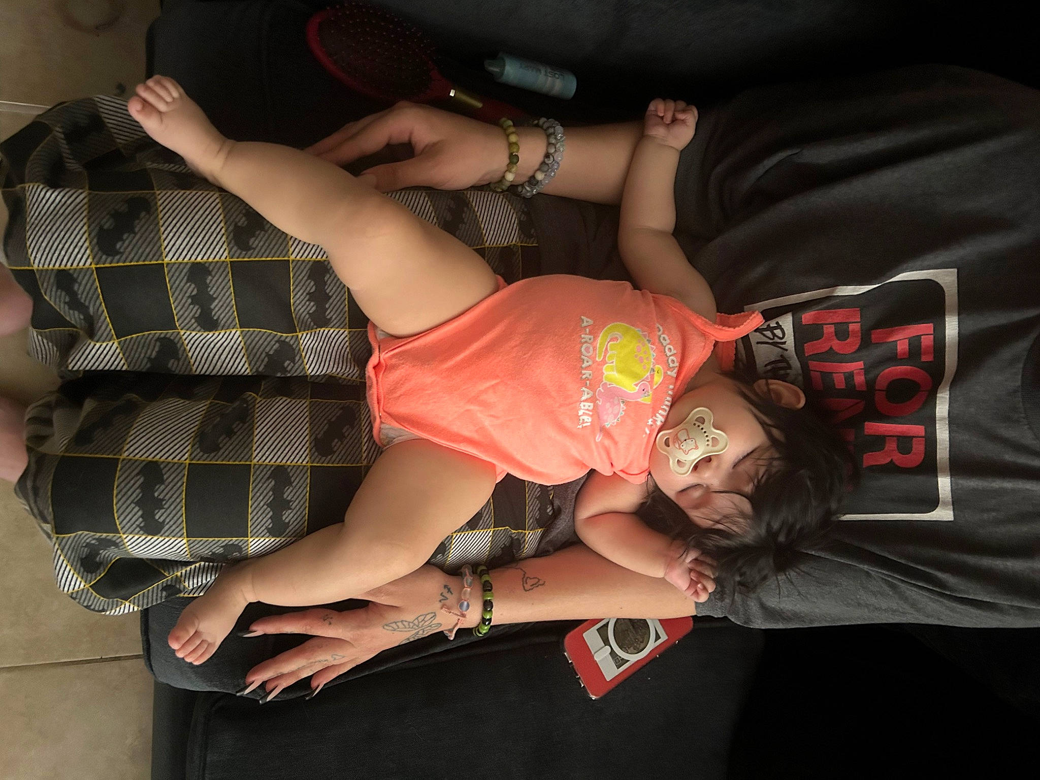 Elaine is registered to the contest to win money with this photo: abdomen, arm, black_hair, chest, dress, elbow, event, flash_photography, hand, hip, human_leg, joint, knee, leg, mouth, person, tartan, thigh, trunk, waist