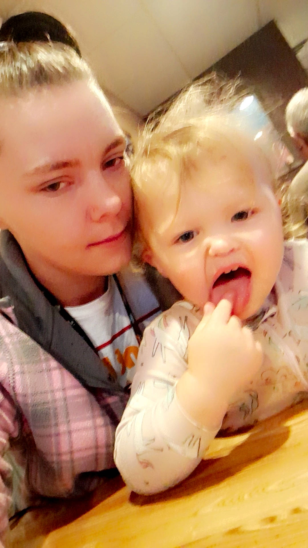 Kairi is registered to the contest to win money with this photo: baby, cheek, child, dress, ear, facial_expression, fun, gesture, happy, head, interaction, iris, lip, mouth, nose, person, sharing, skin, smile, tartan