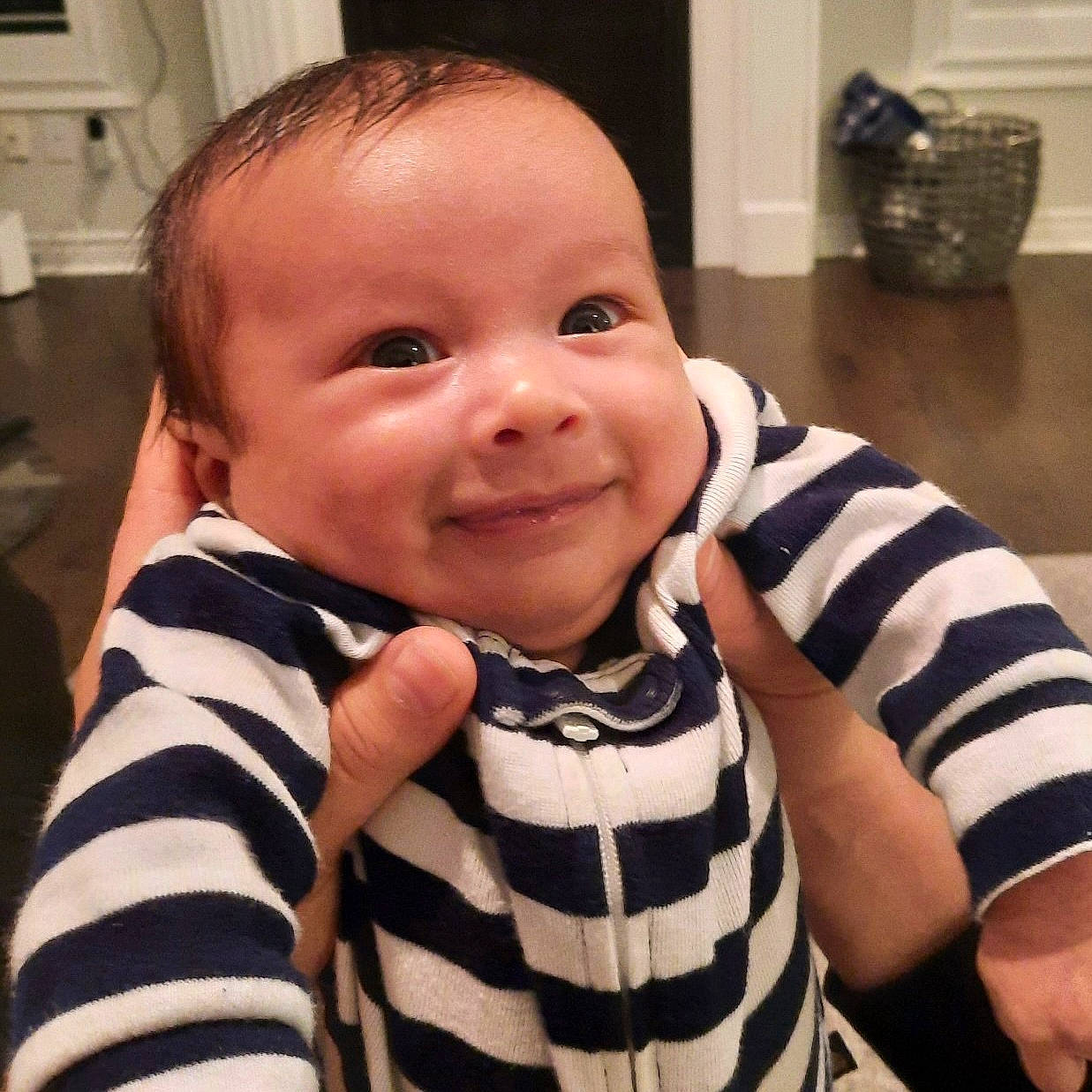 Noah is registered to the contest to win money with this photo: arm, baby, baby_toddler_clothing, cheek, chin, comfort, cool, ear, eyebrow, eyelash, finger, gesture, happy, iris, joy, mouth, nose, person, skin, sleeve