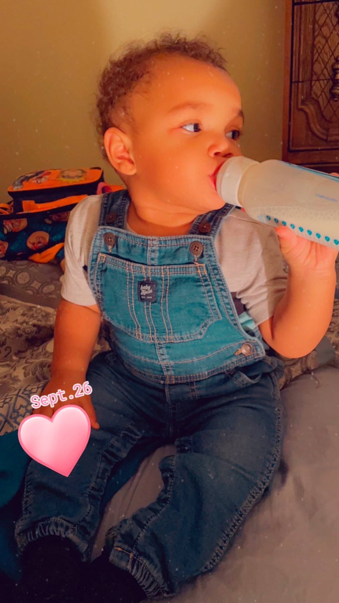 Amir joined the competition — help win amazing prizes! arm, baby_toddler_clothing, cheek, hairstyle, hand, human_body, jeans, joint, leg, lip, mouth, neck, nose, orange, organ, person, shoulder, skin, sleeve, standing