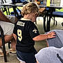 Blake is registered to the contest to win money with this photo: child, competition_event, fun, games, leisure, male, play, recreation, shorts, sitting, summer, t_shirt, toddler, vacation, youth