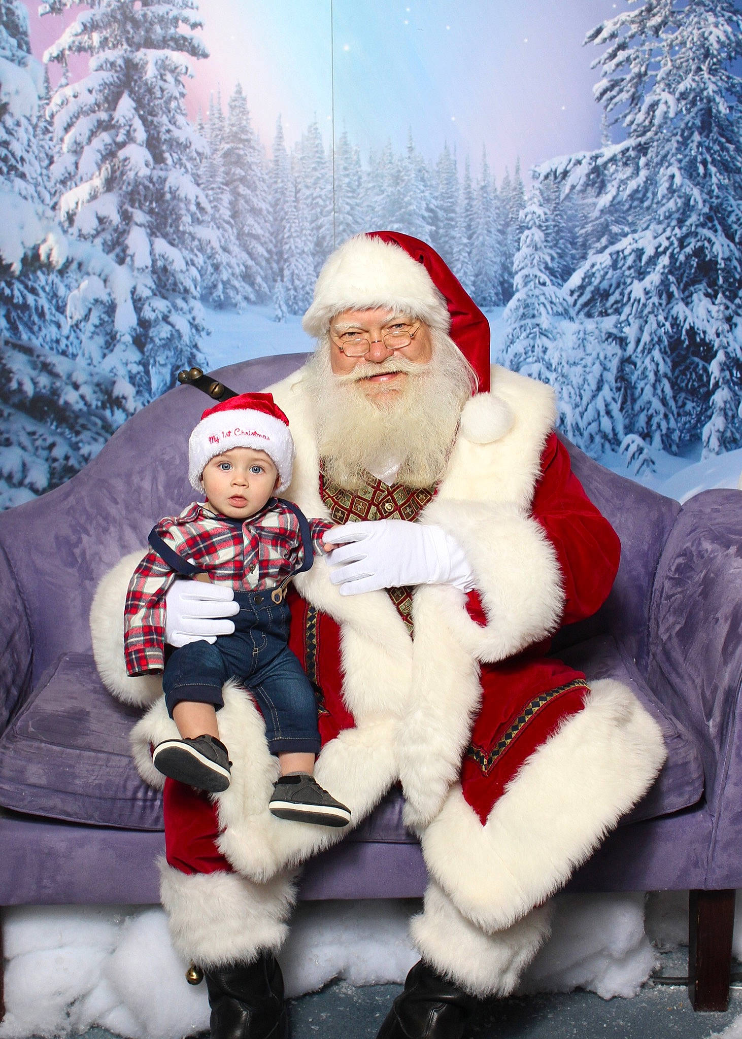 Lukas is registered to the contest to win money with this photo: christmas, christmas_decoration, christmas_tree, fictional_character, freezing, fun, headwear, holiday, lap, person, santa_claus, snow, surprise, tree, winter