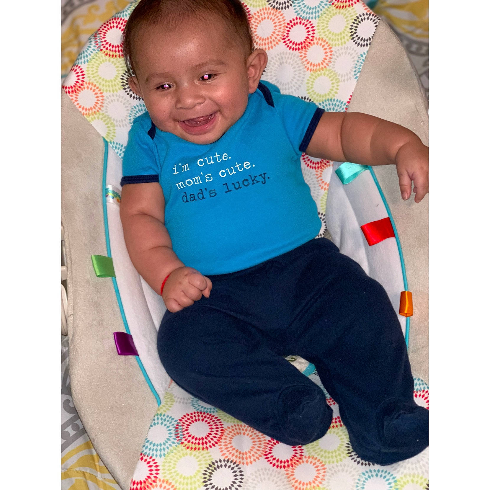 Hector is registered to the contest to win money with this photo: arm, baby_products, baby_toys, child, day, design, infant, joy, material, pattern, person, play, product, sitting, sleeve, t_shirt, textile, toddler