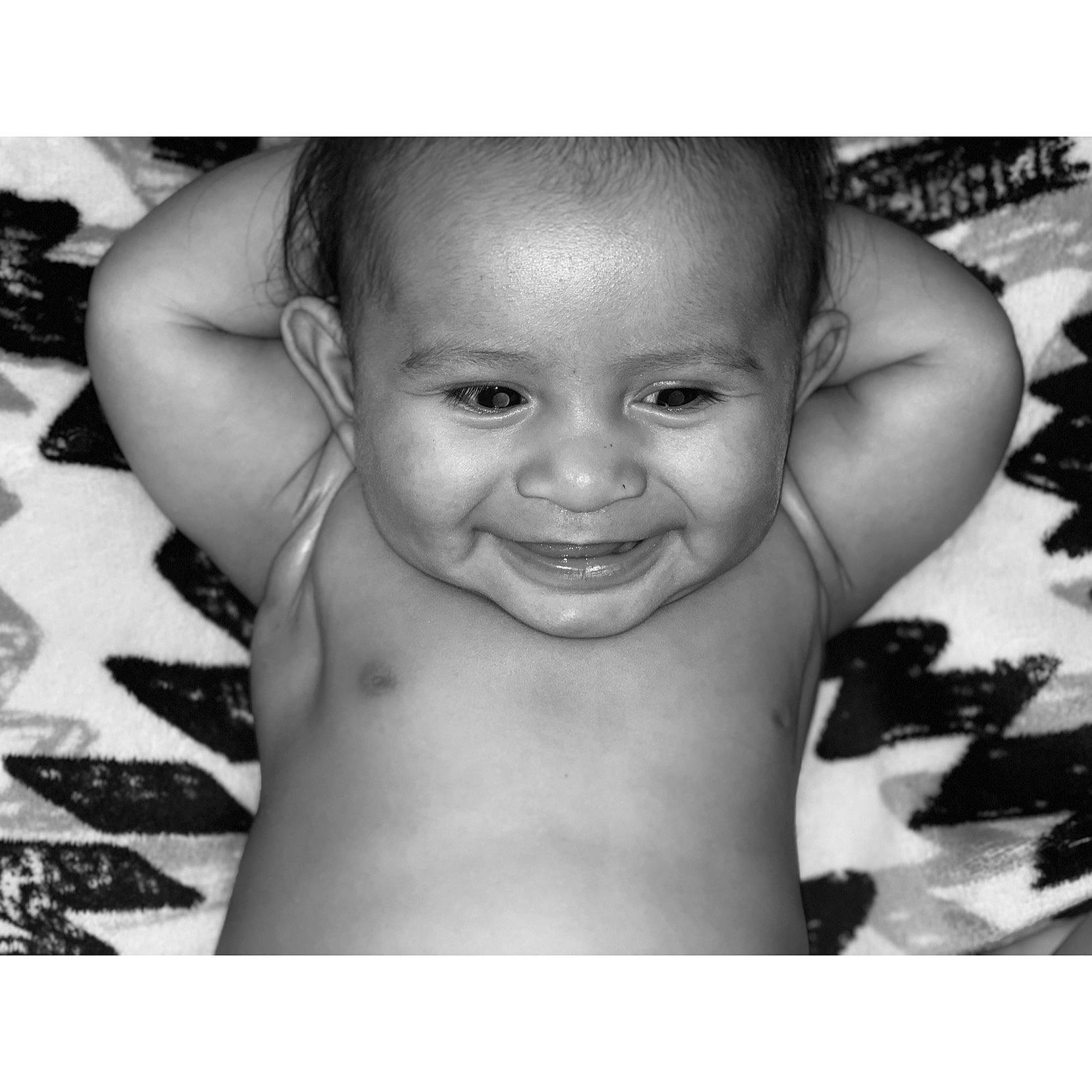 Hector is registered to the contest to win money with this photo: arm, black_and_white, boy, cheek, child, face, facial_expression, forehead, hand, head, infant, joy, laughter, monochrome, monochrome_photography, person, photograph, photography, portrait_photography, smile