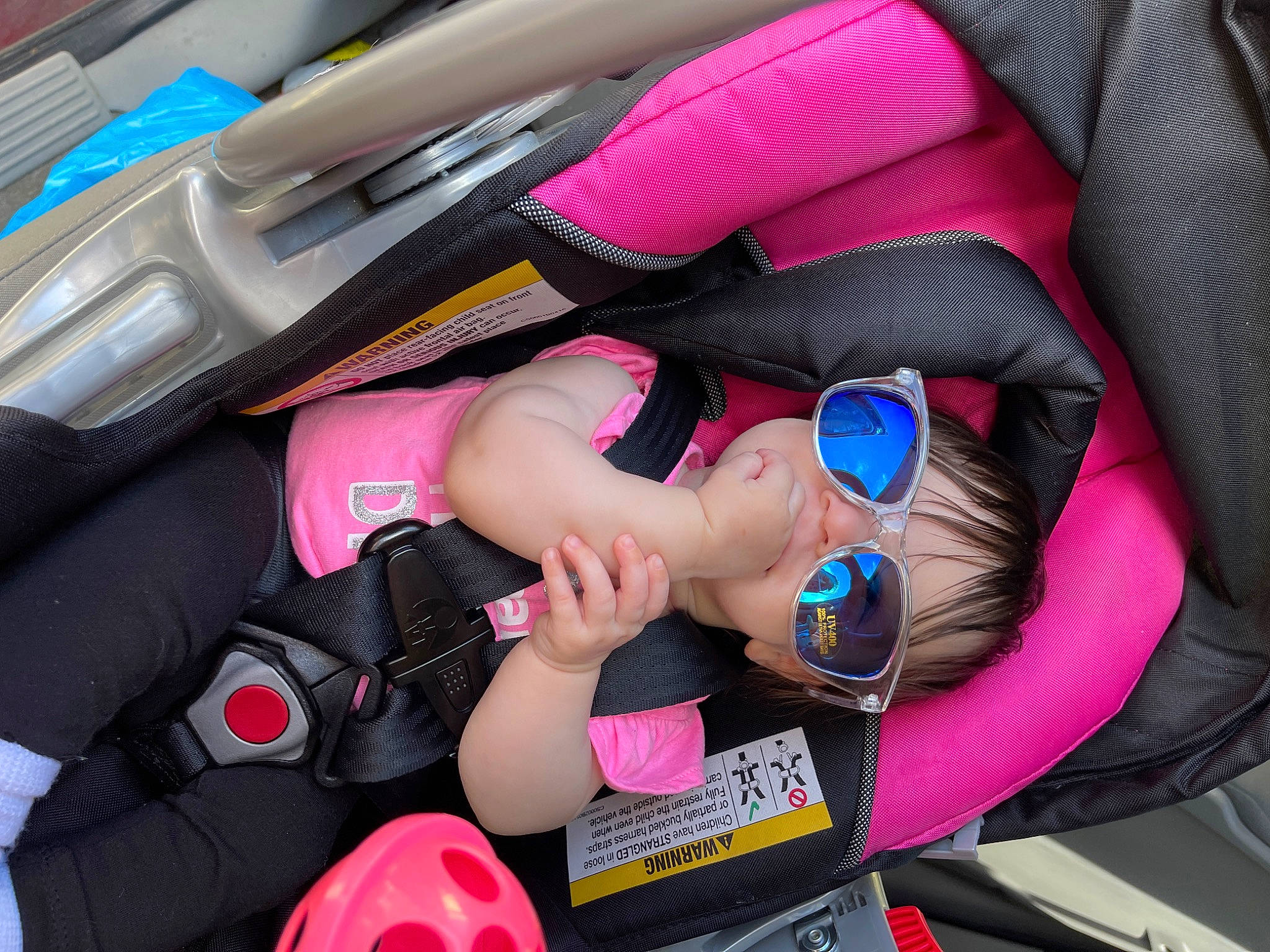 Aurora joined the competition — help win amazing prizes! auto_part, automotive_design, baby_carriage, car_seat, carmine, comfort, electric_blue, finger, fun, gesture, lap, magenta, material_property, nail, person, pink, product, thigh, thumb, toddler