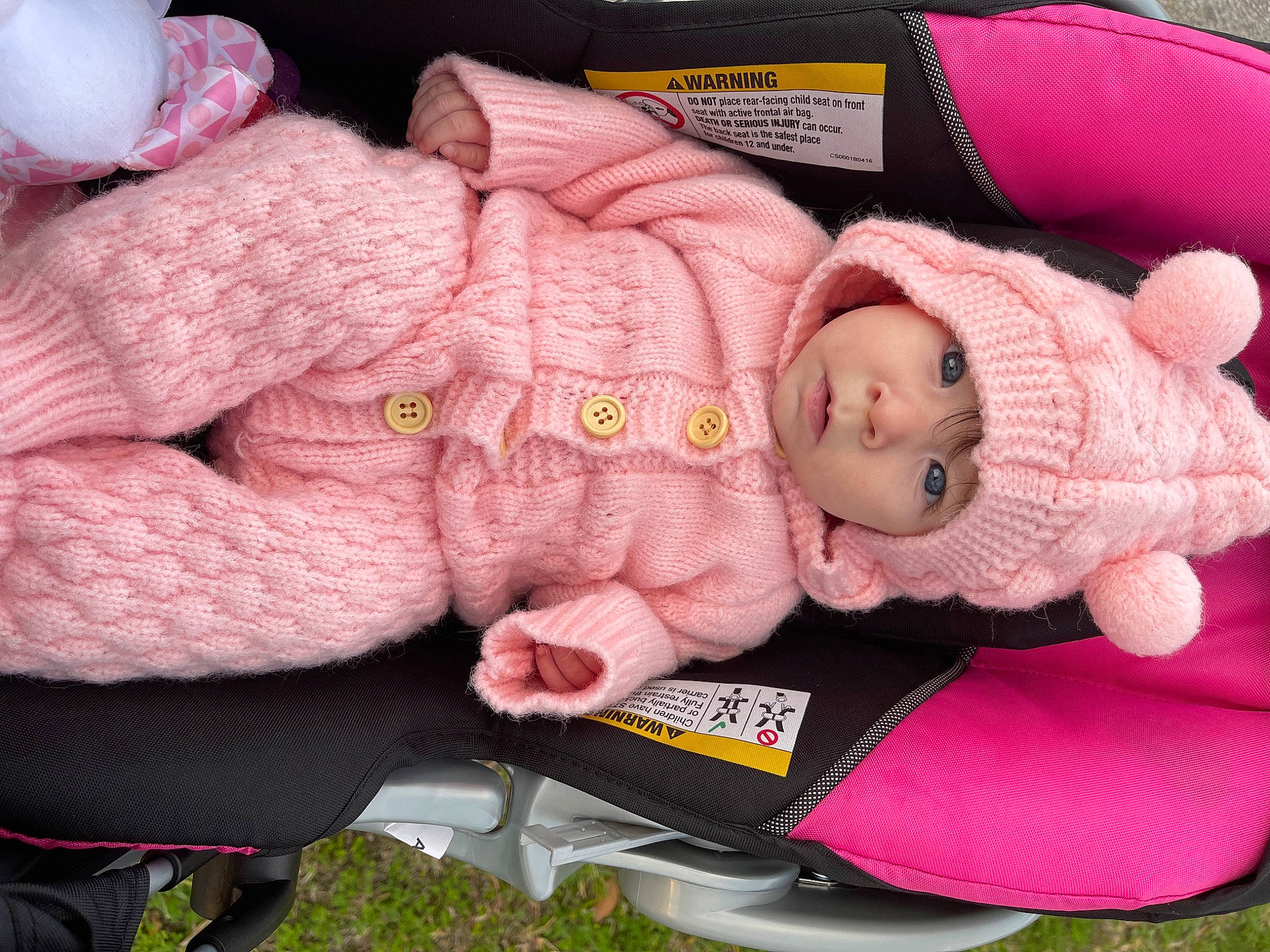 Aurora joined the competition — help win amazing prizes! arm, art, baby, baby_carriage, baby_products, baby_toddler_clothing, cheek, child, comfort, doll, headwear, knit_cap, lap, magenta, person, pink, stuffed_toy, textile, toddler, toy