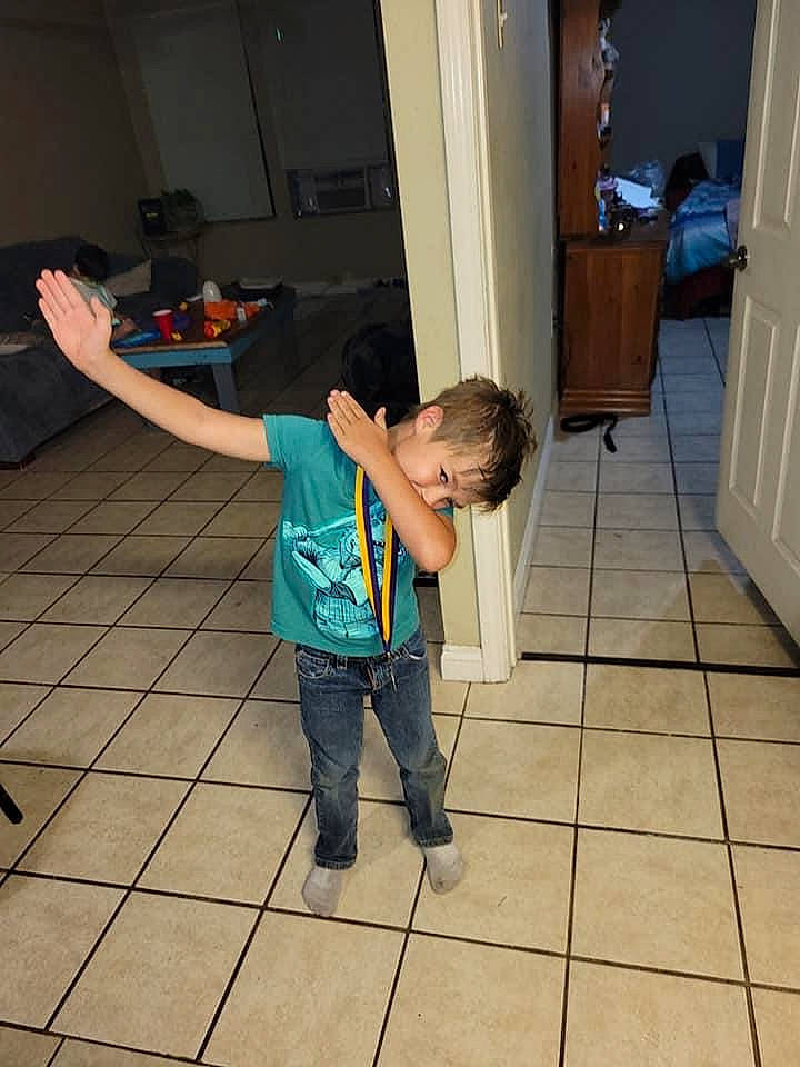 Levii joined the competition — help win amazing prizes! child, cleanliness, door, elbow, floor, flooring, fun, hardwood, hip, home_door, joint, leisure, luggage_and_bags, person, room, shoulder, standing, t_shirt, tile, waist