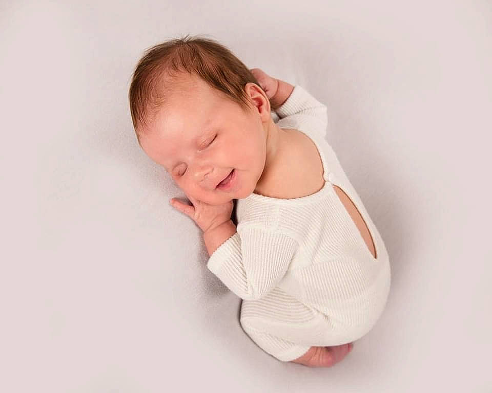Brooke joined the competition — help win amazing prizes! baby, baby_sleeping, baby_toddler_clothing, barefoot, cheek, child, collar, comfort, elbow, flooring, foot, gesture, hair, happy, human_leg, linens, person, sitting, sleeve, toddler
