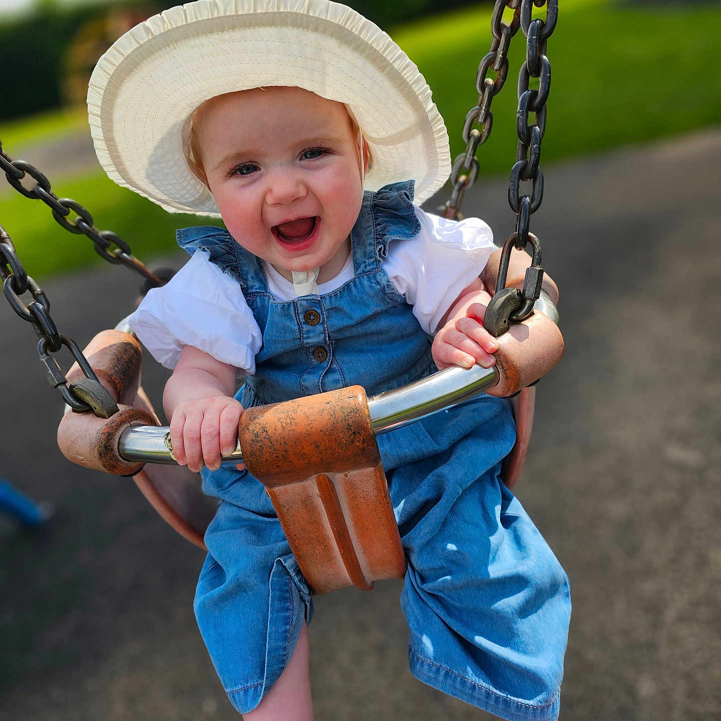 Tilly joined the competition — help win amazing prizes! baby, clothing, coat, face, grass, happy, hat, head, jeans, nature, outdoorplayarea, outdoors, pants, park, person, photography, plant, playarea, portrait, toy