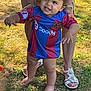 Nahel a rejoint le concours — aidez-le/la à gagner de superbes lots ! toddler, child, grass, outdoor, smiling, person, barefoot, adult, holding, legs, feet, sunlight, sports_jersey, happy, walking, support, summer, nature, playing, family