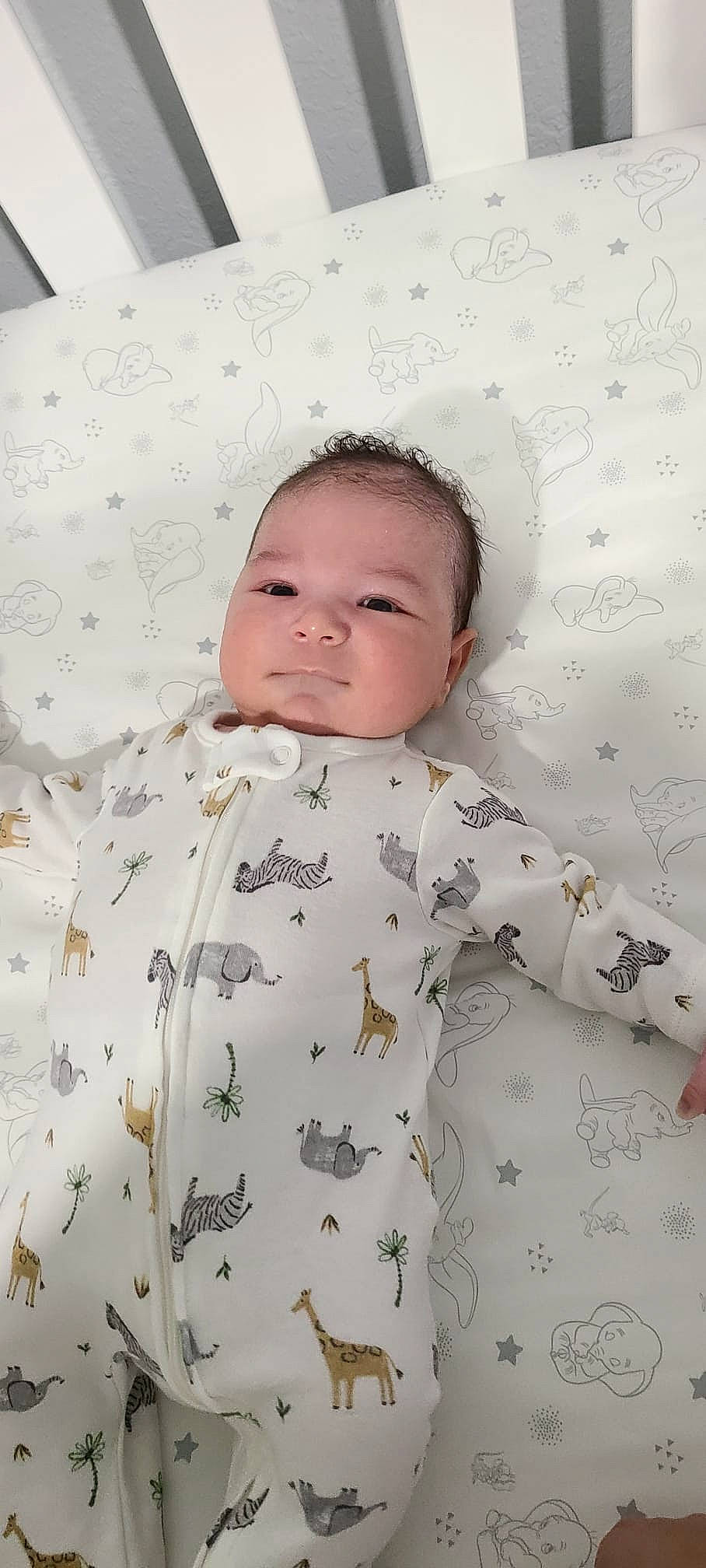 Xian is registered to the contest to win money with this photo: baby, baby_products, baby_toddler_clothing, bedding, child, collar, comfort, face, linens, pattern, person, portrait_photography, product, room, skin, sleeve, textile, toddler