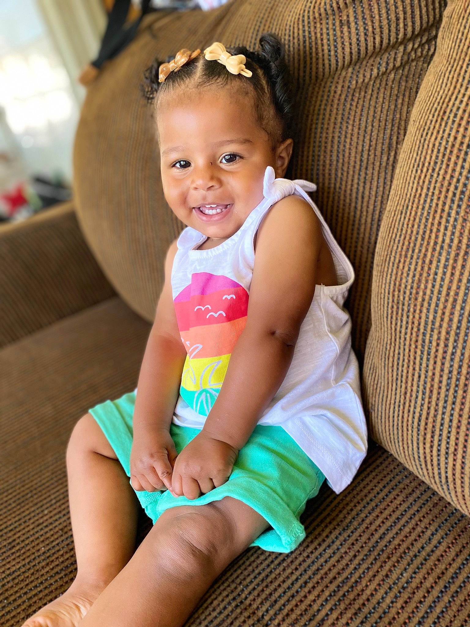 Jaziyah is registered to the contest to win money with this photo: baby_toddler_clothing, child, comfort, eye, finger, fun, hairstyle, happy, head, human_leg, joy, knee, leg, leisure, neck, person, pink, skin, smile, thigh
