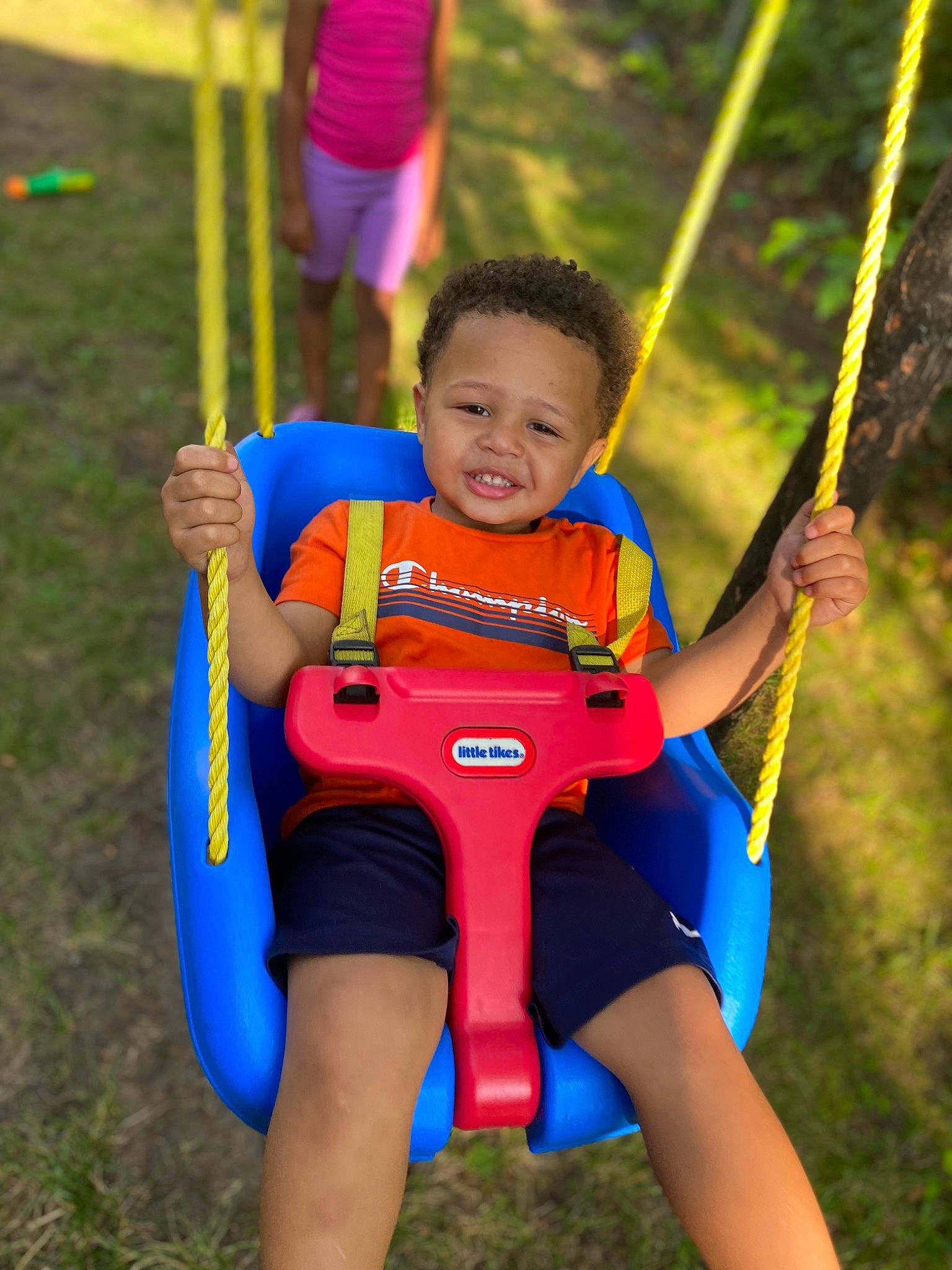 Jonathan joined the competition — help win amazing prizes! baby_toddler_clothing, child, electric_blue, face, fun, happy, human_settlement, leisure, outdoor_play_equipment, people_in_nature, person, play, playground, public_space, recreation, shorts, smile, swing, t_shirt, toddler