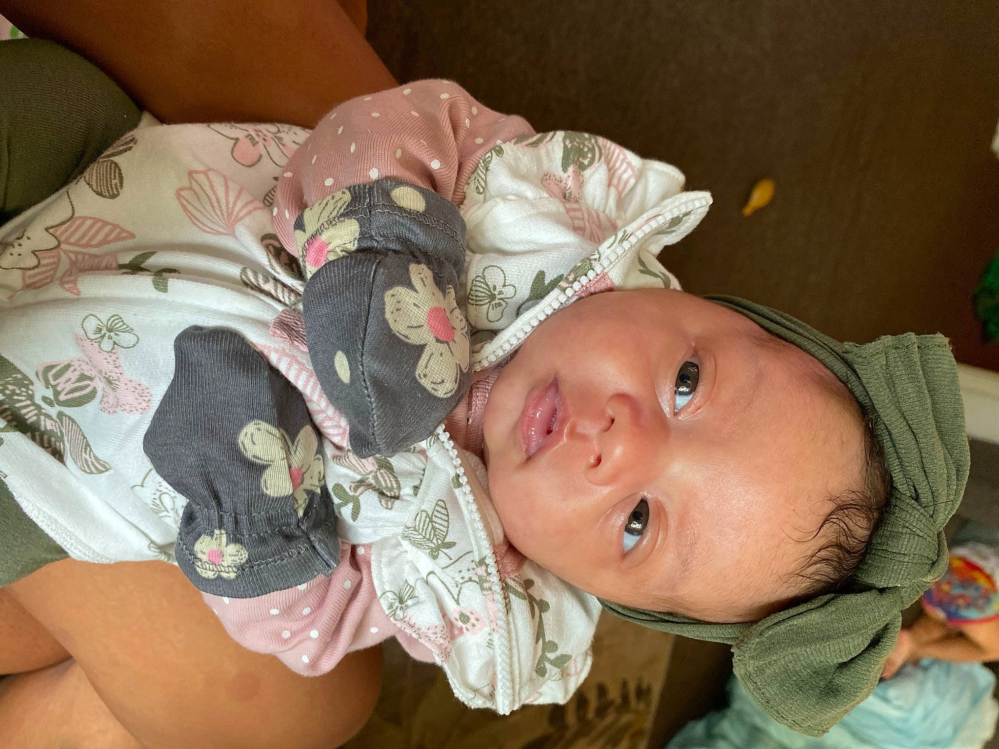 Jazmyn is registered to the contest to win money with this photo: baby, baby_products, baby_toddler_clothing, cheek, child, comfort, eye, fashion_accessory, happy, hat, headgear, iris, mouth, nail, pattern, person, room, rose, skin, textile