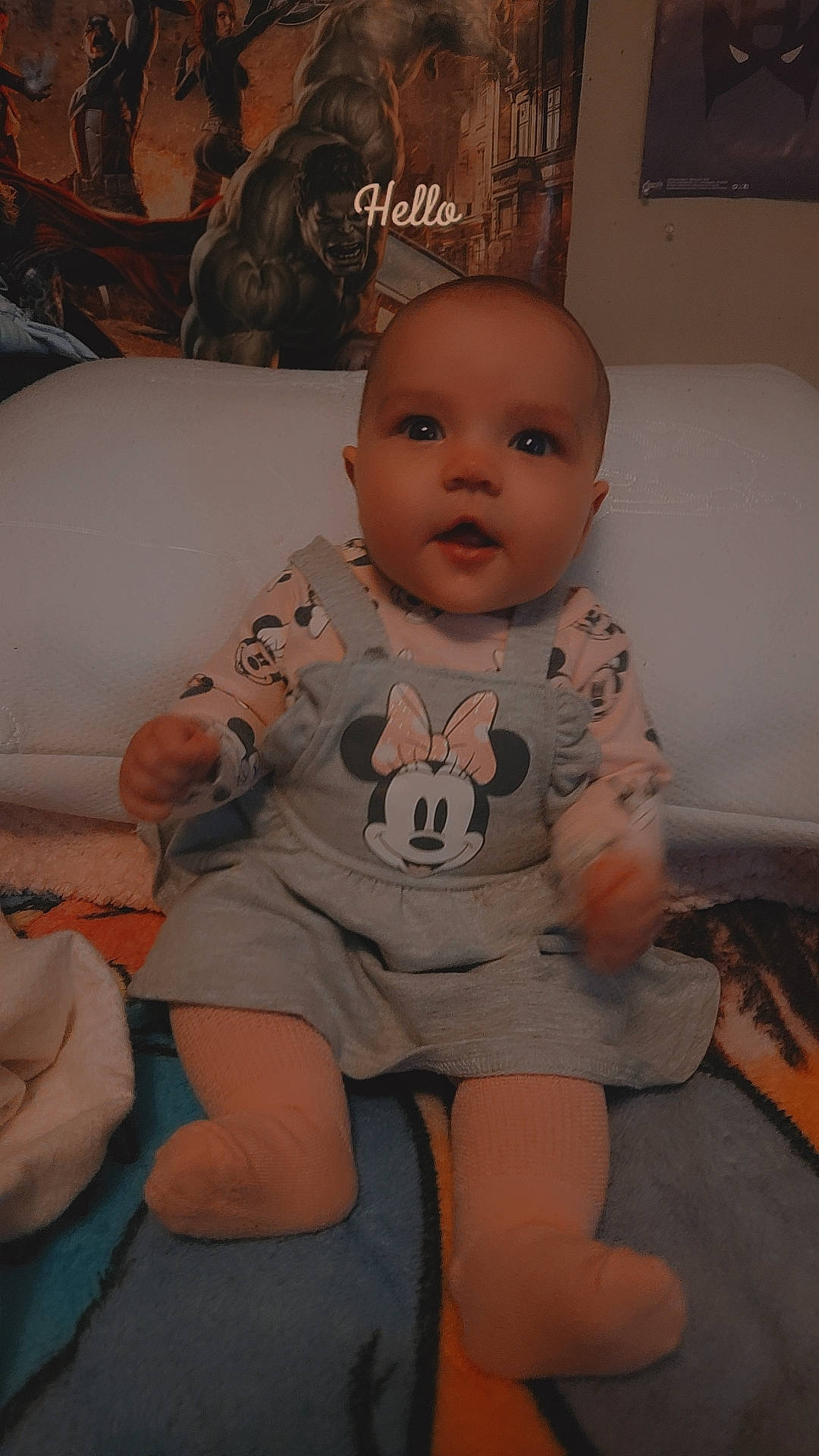Willow is registered to the contest to win money with this photo: abdomen, baby, baby_toddler_clothing, cheek, child, comfort, flooring, fun, human_body, human_leg, knee, mouth, person, picture_frame, sitting, skin, sleeve, t_shirt, thigh, toddler