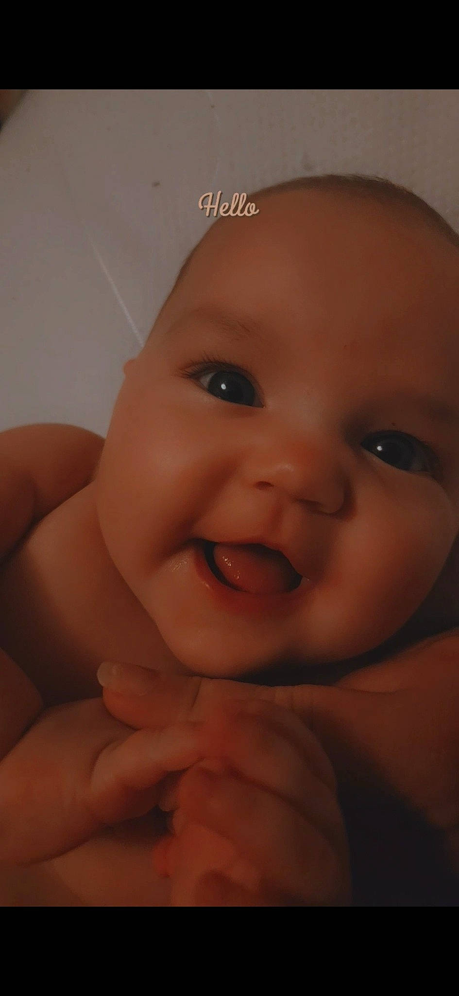 Willow is registered to the contest to win money with this photo: arm, baby, cheek, chin, ear, eyebrow, eyelash, finger, forehead, gesture, happy, human_body, iris, lip, mouth, neck, nose, person, skin, smile