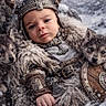 baby, child, viking, helmet, fur_cloak, armor, wolf_pups, snow, winter, outdoor, portrait, costume, helmet_with_horns, shield, axe, fur, cute, animal, nature, young_child