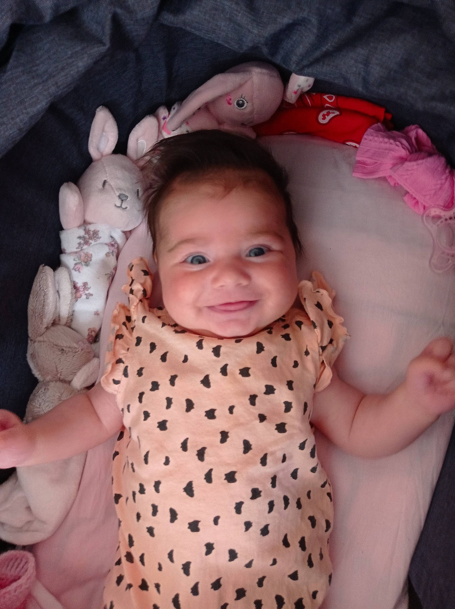Gloria joined the competition — help win amazing prizes! arm, baby, baby_toddler_clothing, cheek, comfort, facial_expression, gesture, hairstyle, hand, joy, mammal, neck, nose, organ, person, pink, product, skin, sleeve, smile