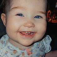 Hayzleigh joined the competition — help win amazing prizes! baby, smiling, blue_eyes, toothy_grin, floral_onesie, stains, face, child, cute, happy, infant, portrait, close_up, skin, person, head, expression, indoors, light, dark_background