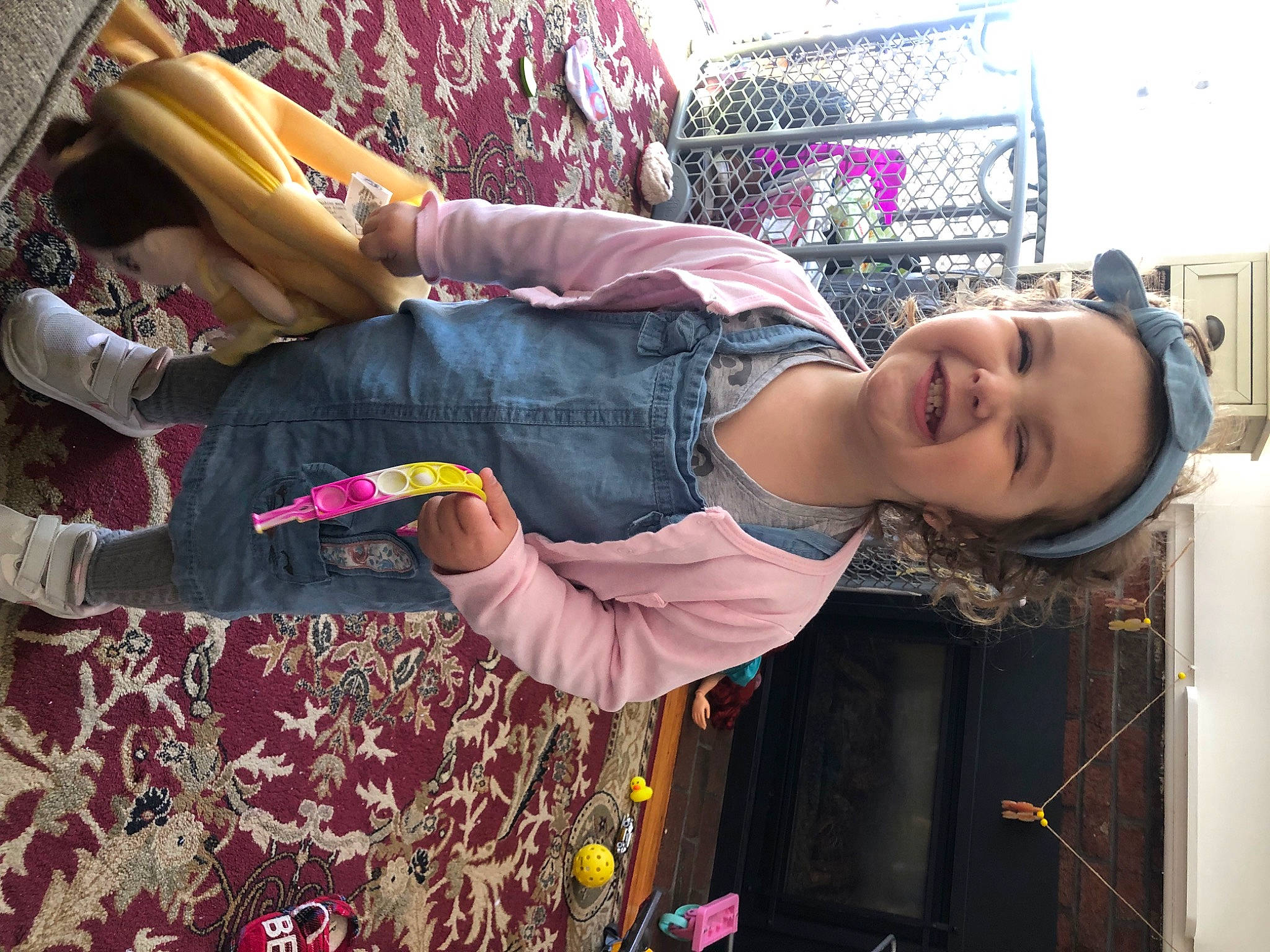 Claire is registered to the contest to win money with this photo: abdomen, cool, eyewear, fashion_design, flesh, fun, happy, hat, human_leg, joy, leisure, magenta, pattern, person, pink, purple, smile, t_shirt, thigh, trunk