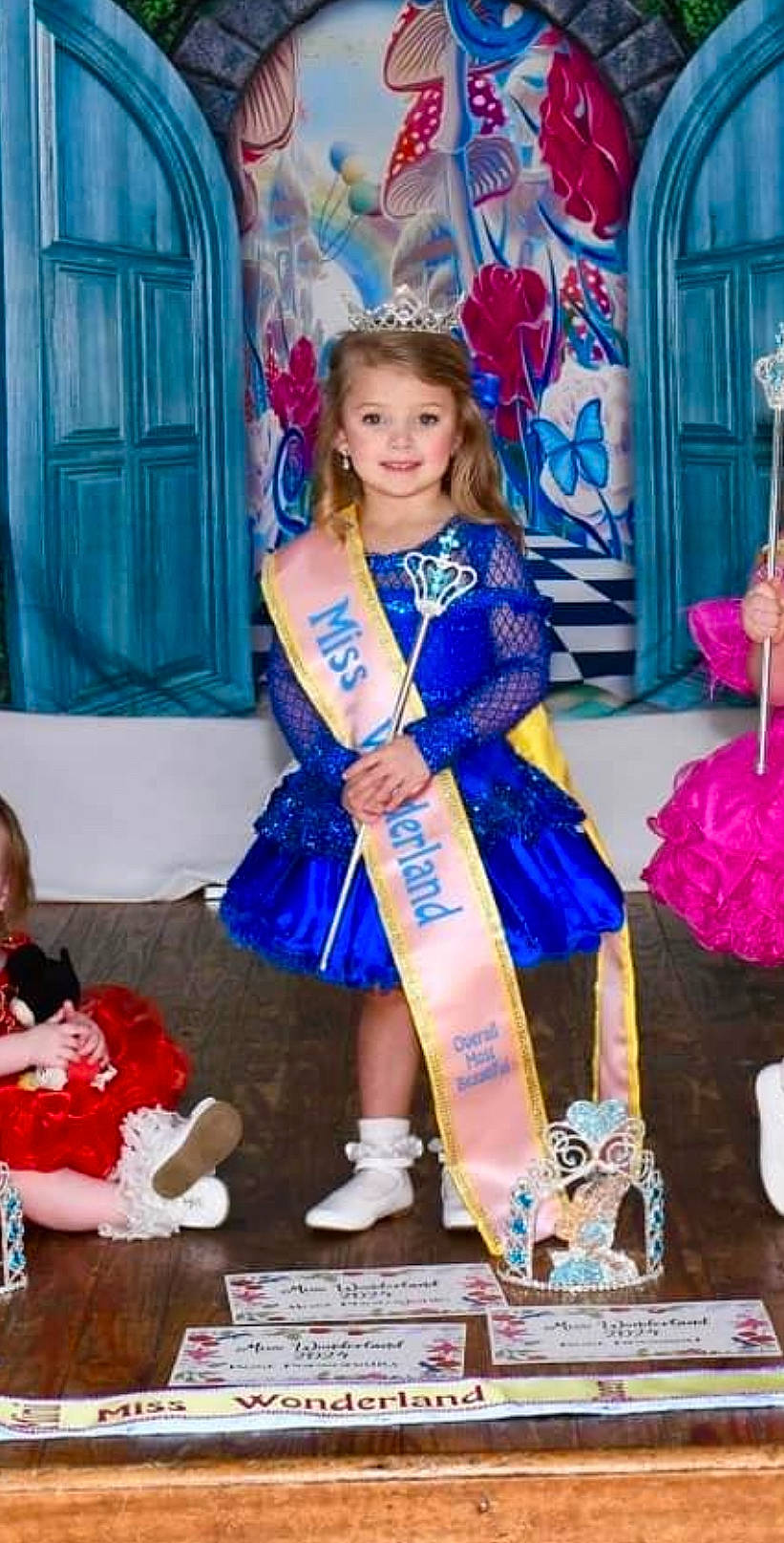 Josie is registered to the contest to win money with this photo: blue, child, costume, curtain, electric_blue, event, fashion_design, fun, happy, holiday, joy, magenta, party, person, pink, purple, room, smile, toddler