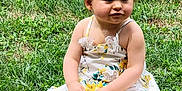 Alyna participe au concours pour gagner de l'argent avec cette photo : baby, casual, child, curious, dress, field, floral, grass, greenery, nature, outdoor, person, play, shoes, sitting, summer, sunlight, toddler, toy, young