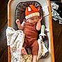 Odin joined the competition — help win amazing prizes! baby, baby_gear, baby_rocker, blanket, child, clothing, comfort, cozy, cute, fox_ears, indoors, infant, knit_hat, overalls, plush_toy, portrait, resting, sleepy, soft_toy, wood_floor
