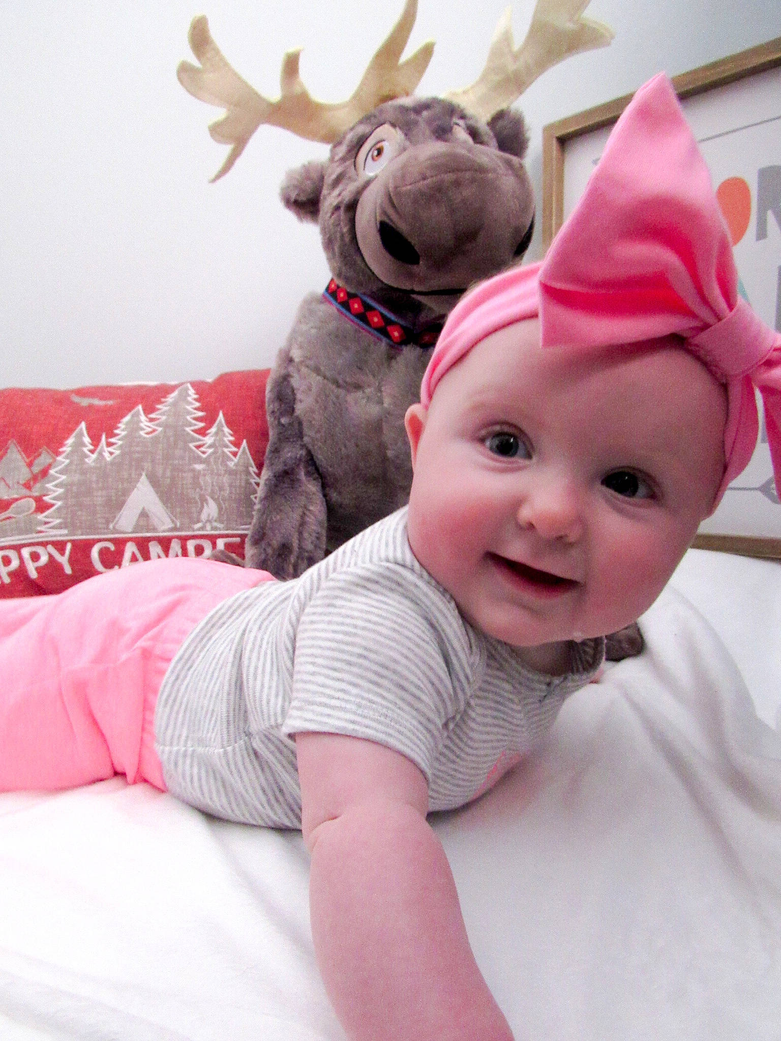 Kirra is registered to the contest to win money with this photo: antler, baby, child, costume, costume_accessory, crown, ear, fashion_accessory, fawn, hair_accessory, happy, head, headgear, person, pink, room, skin, toddler