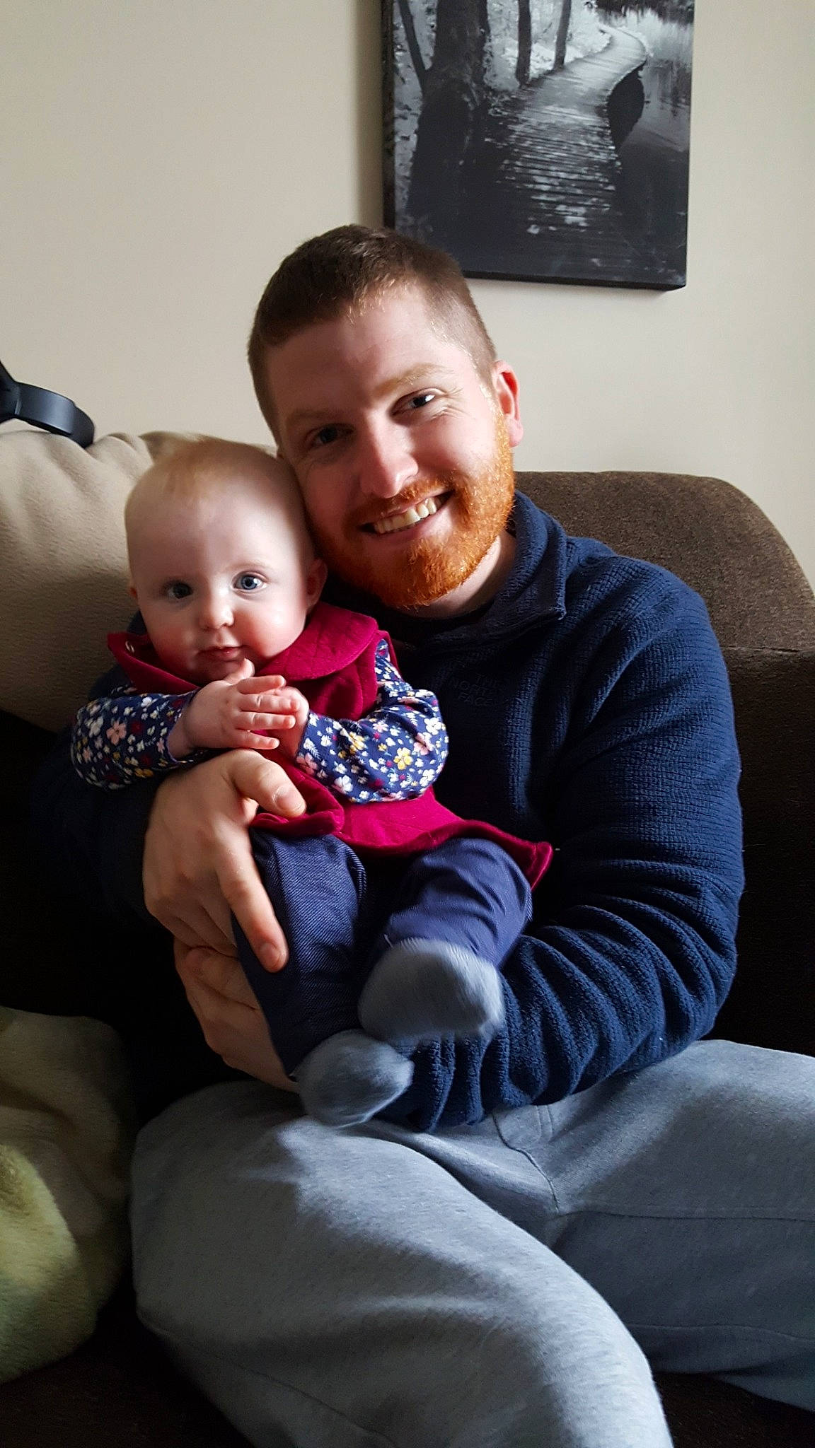 Kirra joined the competition — help win amazing prizes! baby, child, comfort, couch, daughter, family, father, joy, lap, male, people, person, sitting, toddler