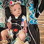 Emery Rose joined the competition — help win amazing prizes! baby, car_seat, infant, headband, oxygen_tube, medical_equipment, socks, floral_pattern, straps, wooden_floor, indoors, child, cute, looking_at_camera, seated, closeup, person, healthcare, wearing_clothes, safety