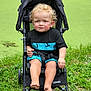 Ricky joined the competition — help win amazing prizes! accessories, baby, backyard, clothing, face, grass, head, lawn, machine, nature, outdoors, park, person, photography, plant, portrait, shorts, strap, stroller, yard