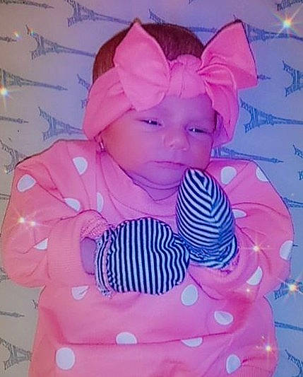 Kenlee is registered to the contest to win money with this photo: baby, baby_products, baby_toddler_clothing, cap, cheek, child, costume_hat, electric_blue, fashion_accessory, hair_accessory, happy, headgear, headwear, magenta, pattern, person, pink, purple, sleeve, textile