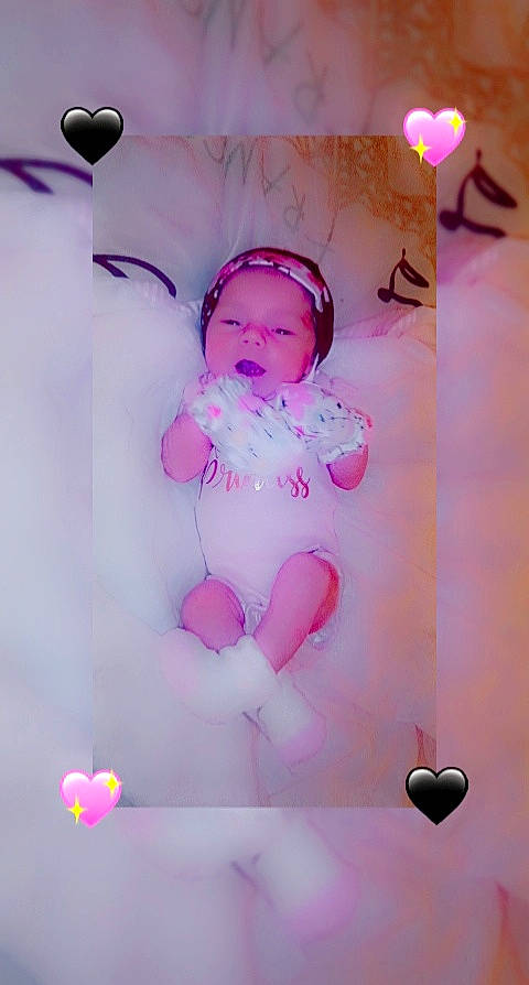 Kenlee is registered to the contest to win money with this photo: abdomen, art, baby, baby_toddler_clothing, ceiling, chest, event, fictional_character, happy, light, lighting, magenta, material_property, ornament, pattern, peach, person, pink, purple, toddler