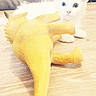 Bubulle a rejoint le concours — aidez-le/la à gagner de superbes lots ! kitten, white_cat, heterochromia, yellow_toy, dinosaur_toy, wooden_floor, cat_bed, black_and_white_cat, pet, indoor, curious, animal, playful, feline, young_cat, toy, floor, cozy, resting_cat, close_up