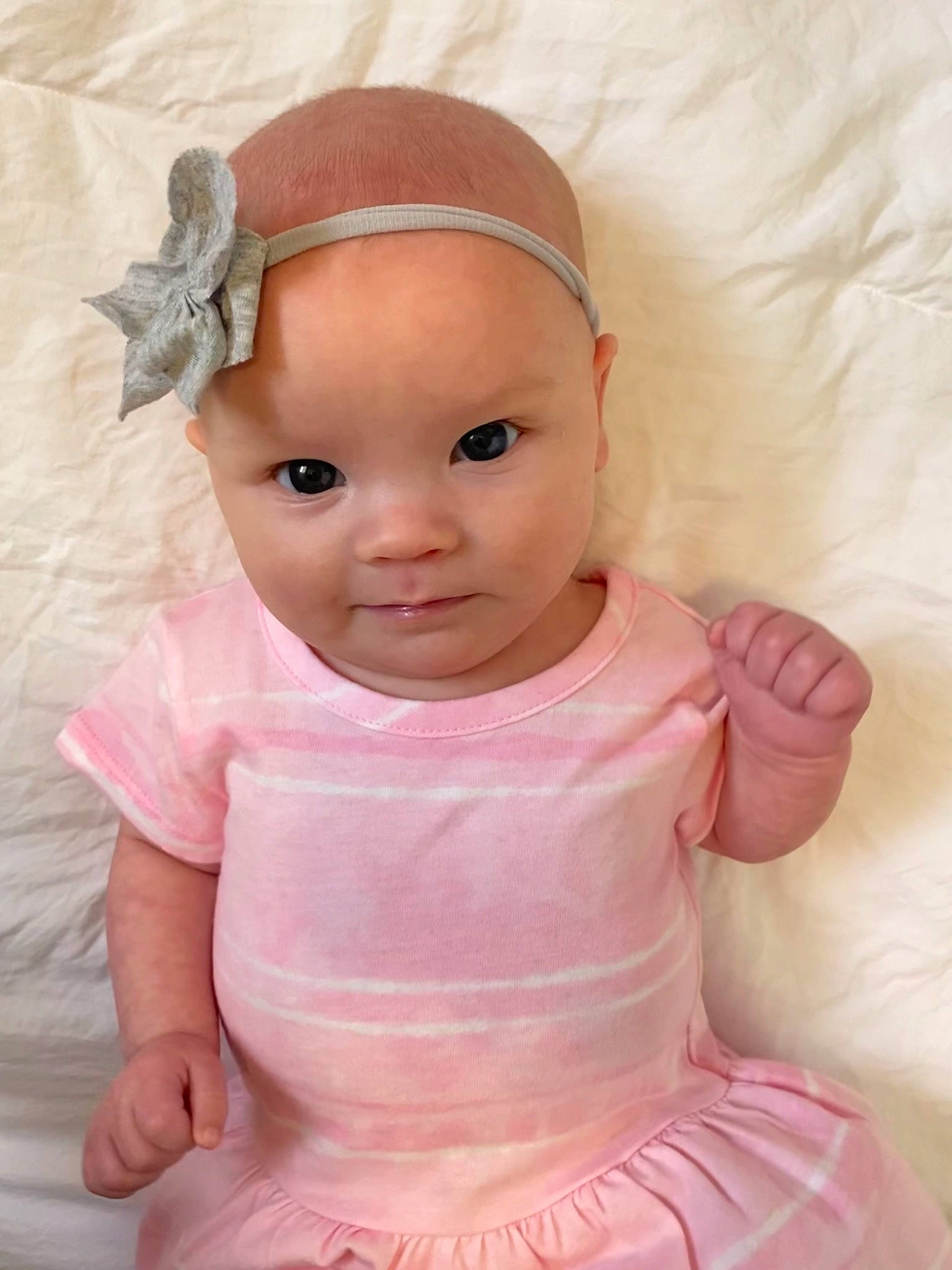Madelyn joined the competition — help win amazing prizes! baby, baby_toddler_clothing, cheek, chin, dress, eye, eyebrow, eyelash, face, happy, head, human_body, iris, lip, neck, person, pink, skin, sleeve, textile